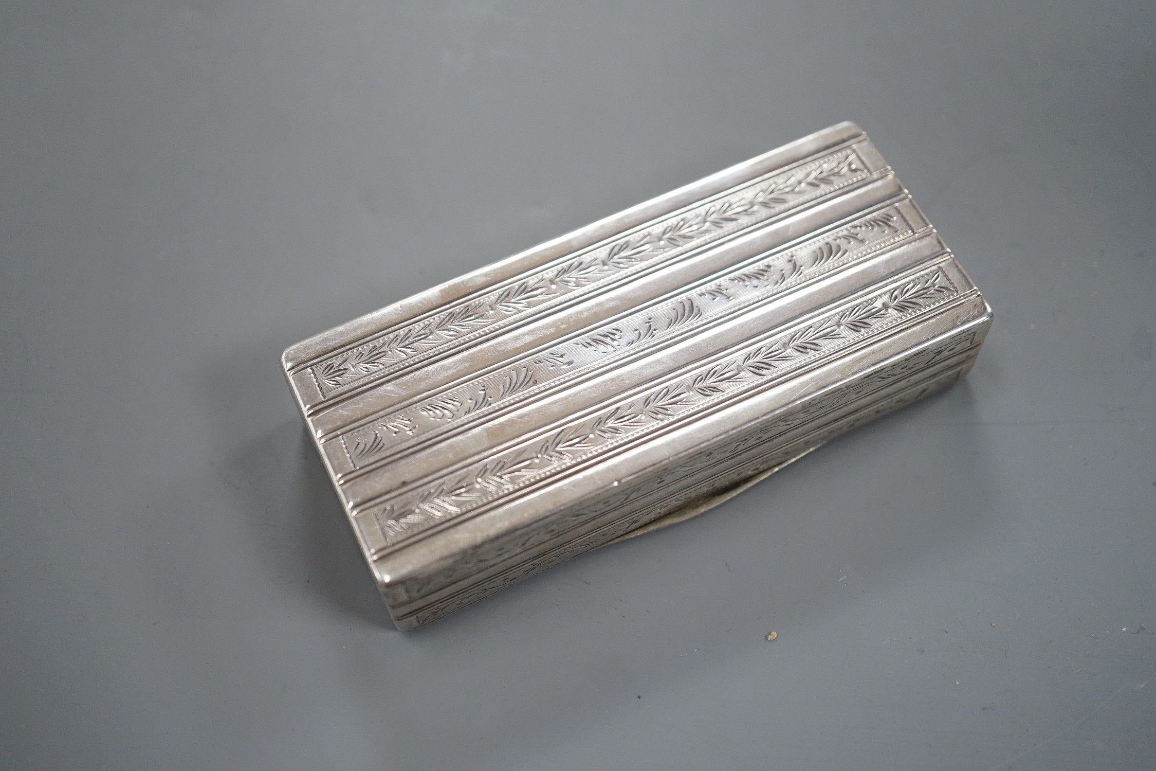 A mid 19th century Portuguese white metal rectangular snuff box, Oporto 1843-1853 mark, 87mm, 83 grams.